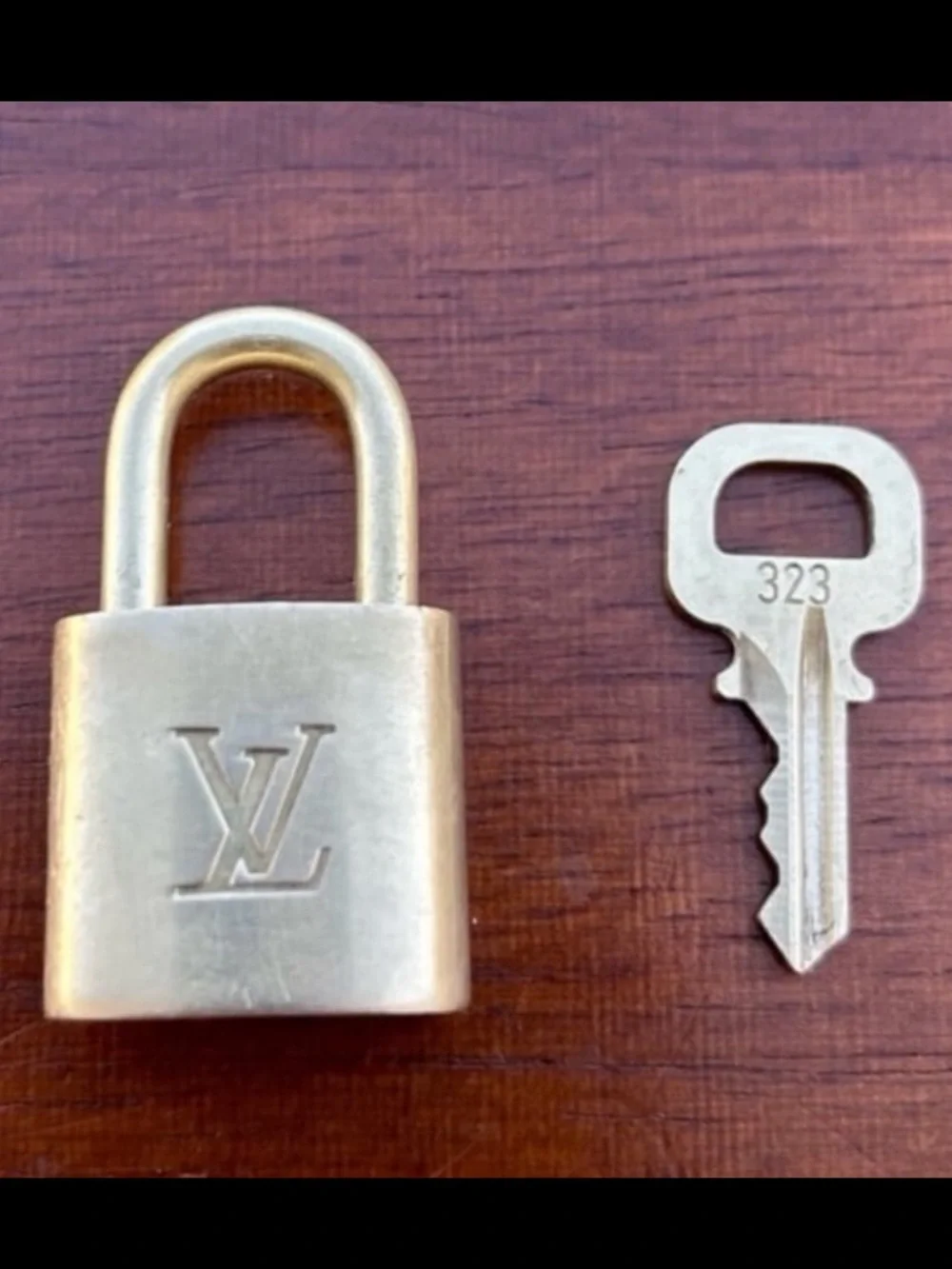 Louis Vuitton padlock with key #323